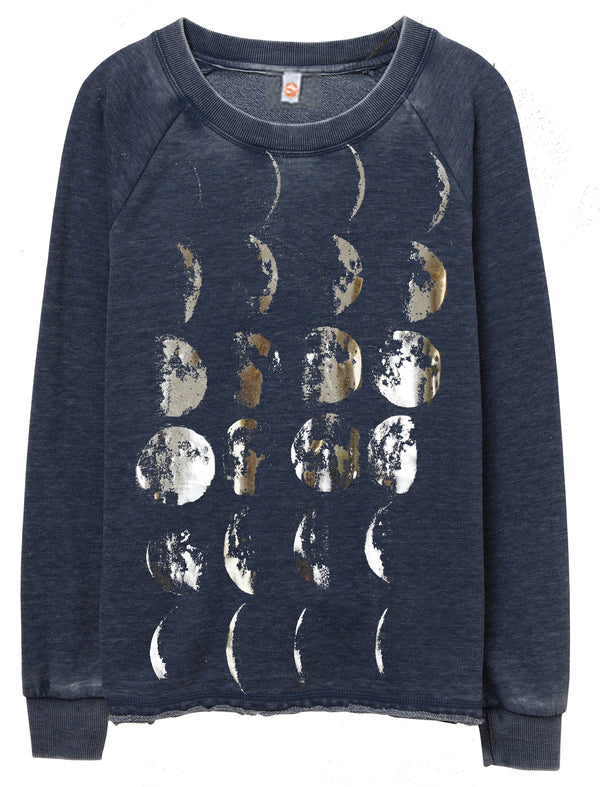 Iridescent silver Moon Phases on a washed navy burn-out sweatshirt.