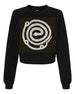 Coiled Snake in black & white cropped fleece sweatshirt.