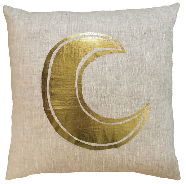Gold Crescent Moon on a raw linen cushion.